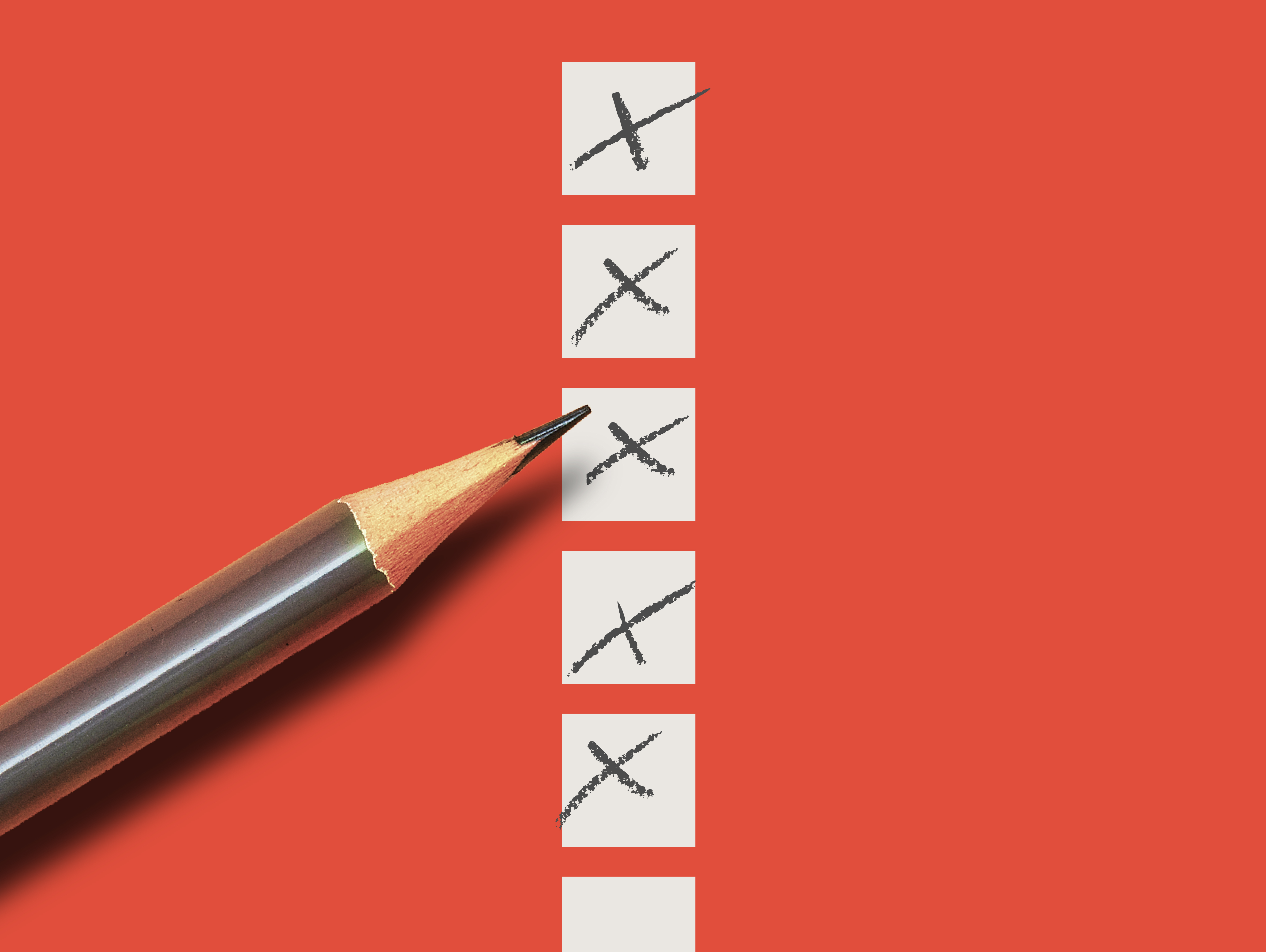 A pencil checks off boxes on a list. 